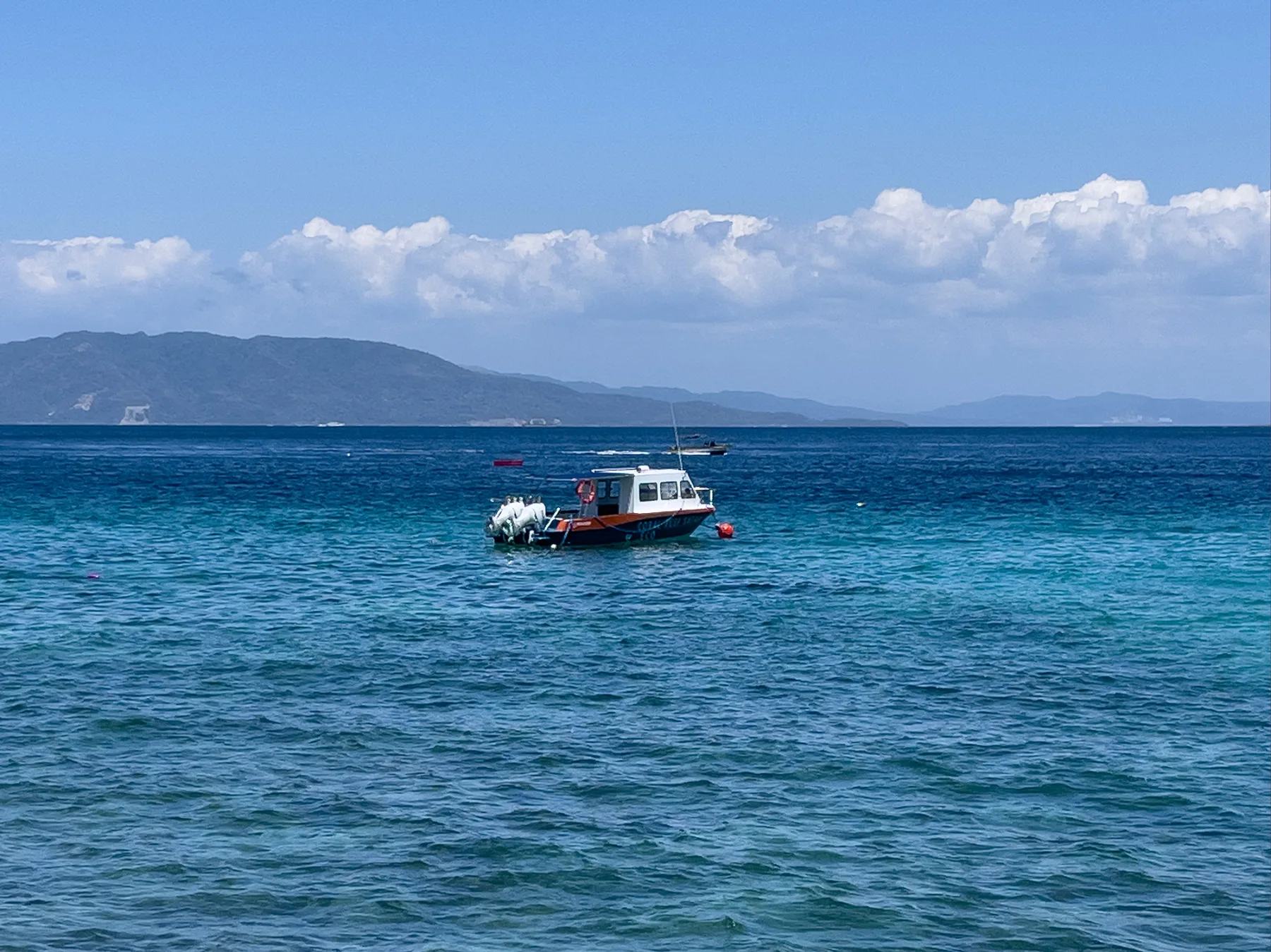 coral reef safari dive boat at verde passage philippines