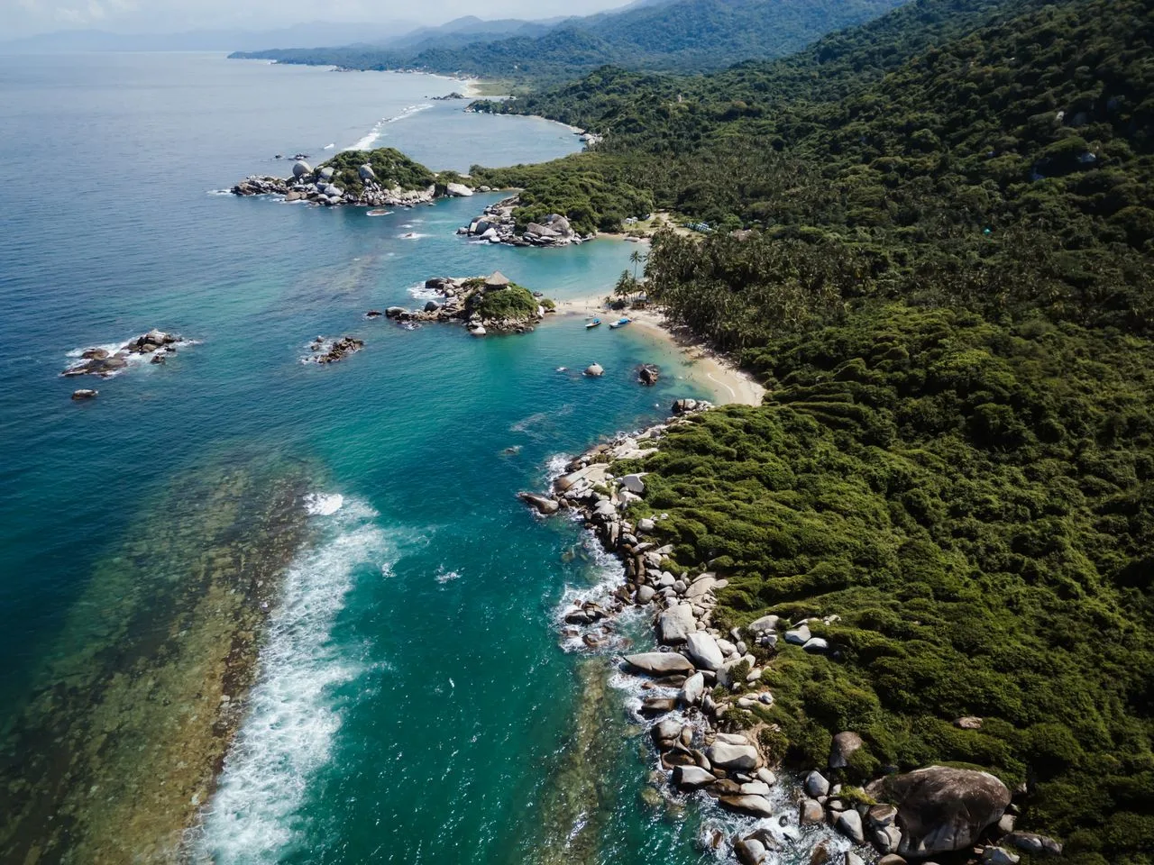 Aerial view of the bays and forested coastline of Tayrona National Park near Santa Marta, Colombia