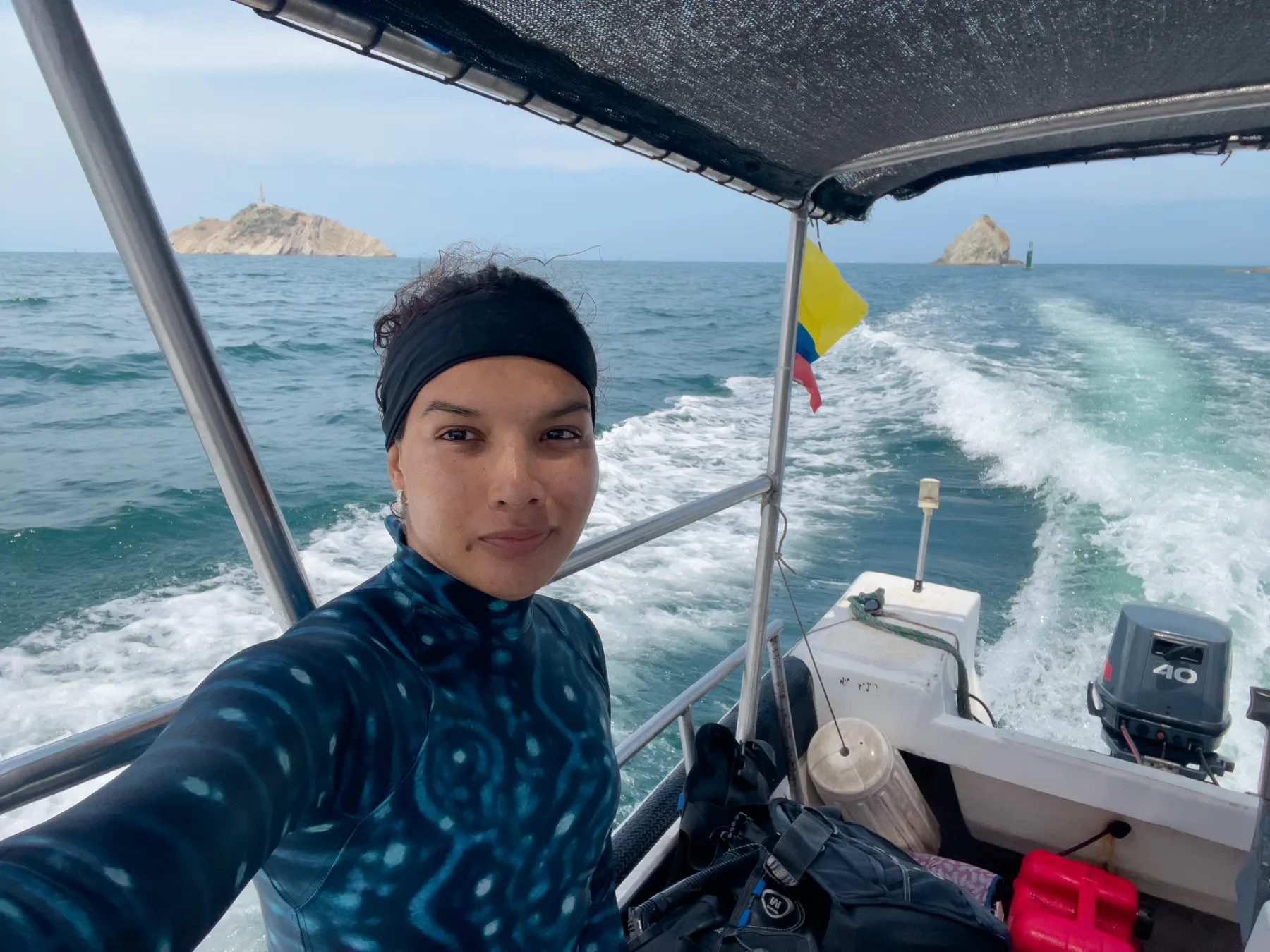 Caro Santamaria on a dive boat heading out to the dive sites of Santa Marta, Colombia