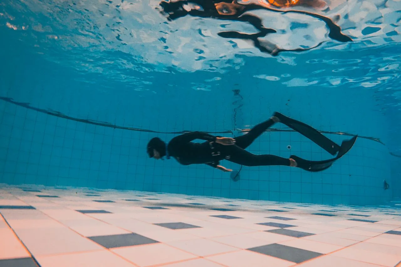 freediver training in a pool