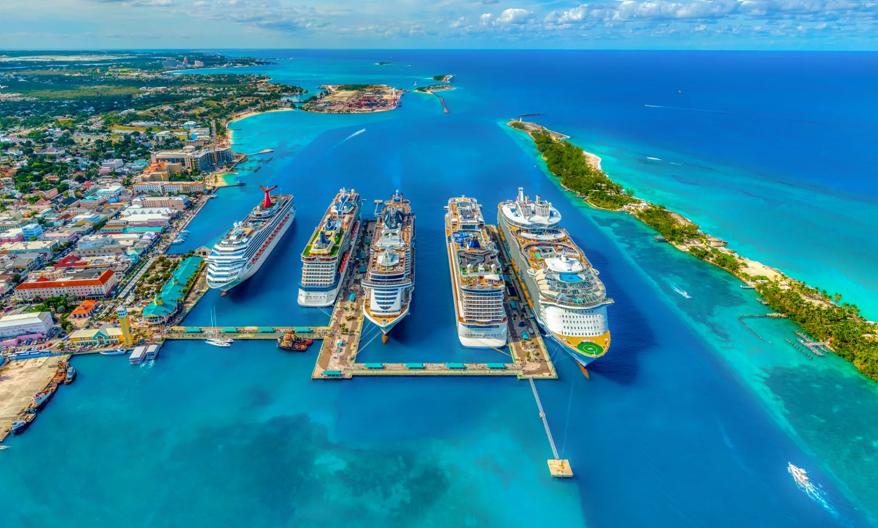 Cruise ships over a coral reef in the Bahamas