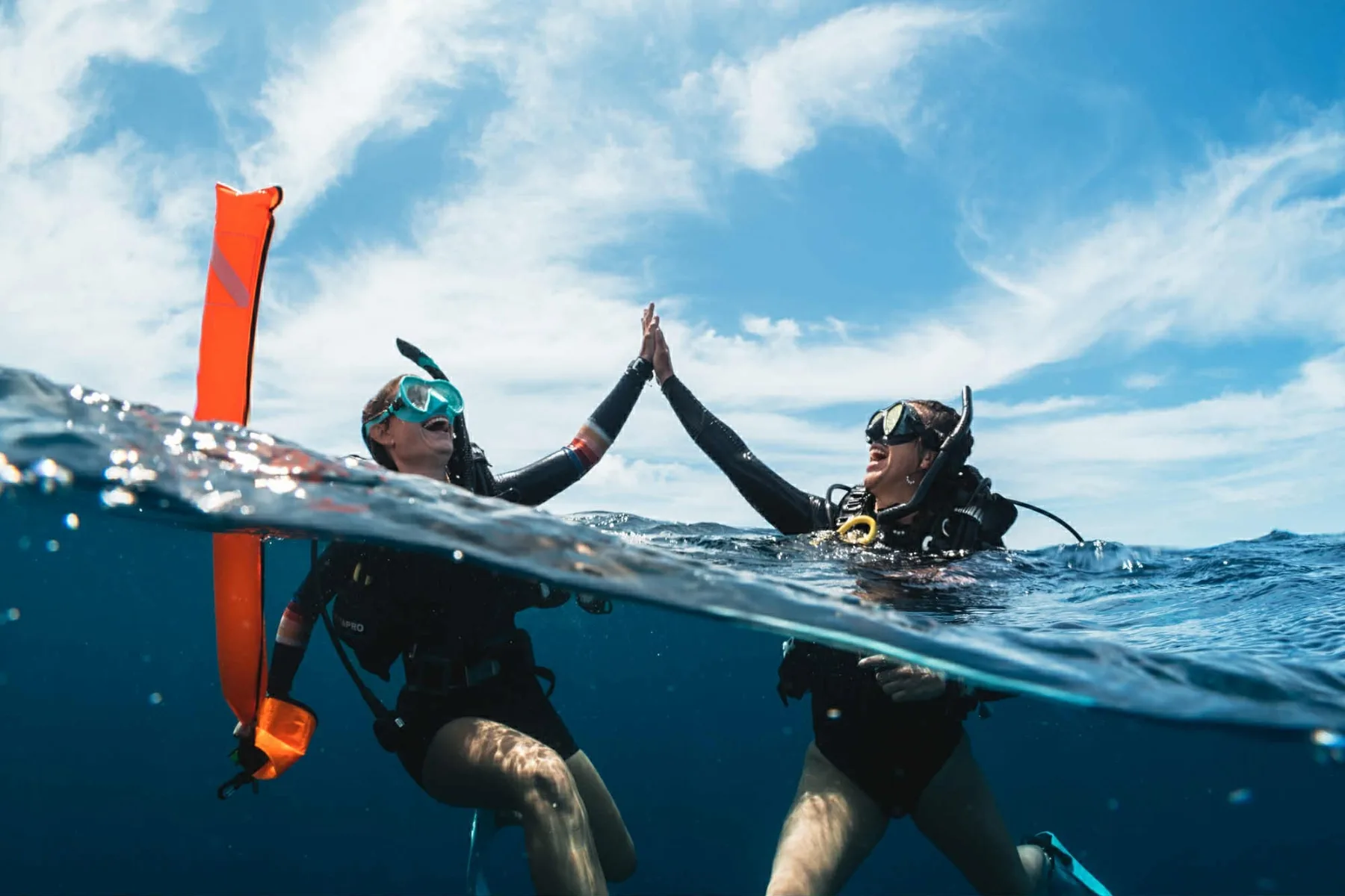 female scuba divers in the ocean during PADI advance open water course with bans diving resort koh tao thailand 