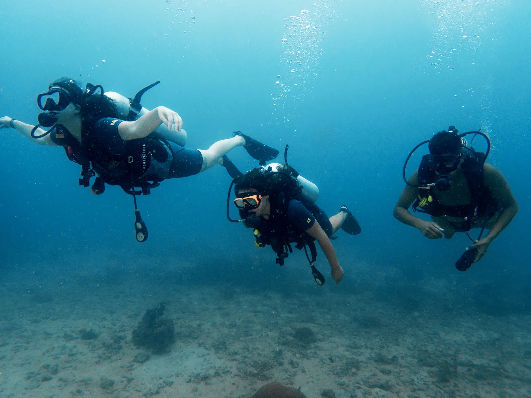 three scuba divers during discover scuba dive in koh tao thailand