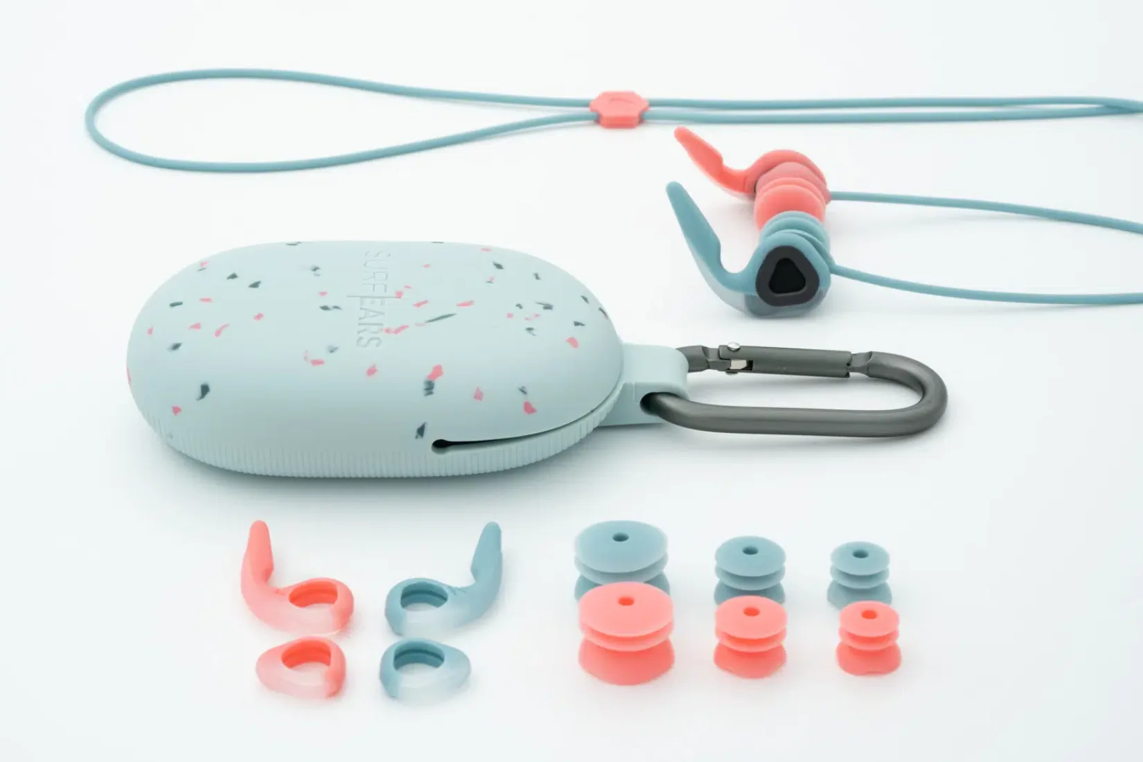 SurfEars 4.0 scuba diving earplugs laid out with their interchangeable plugs